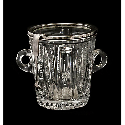 Sub.:14 - Lote: 191 -  Cubitera en cristal tallado con borde de plata punzonada y pinzas en metal plateado.