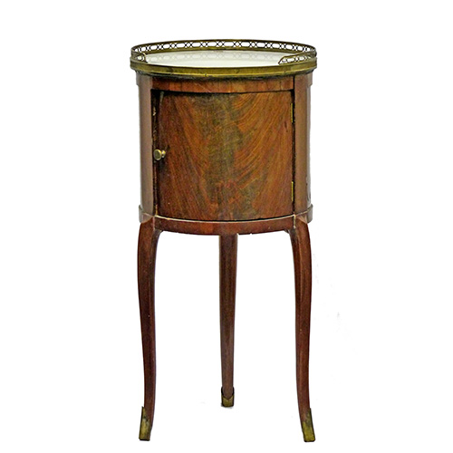 Sub.:16 - Lote: 337 -  Mesa de tambor en palma de caoba. Con tapa de mrmol y galera de bronce. Francia, s. XIX. 
