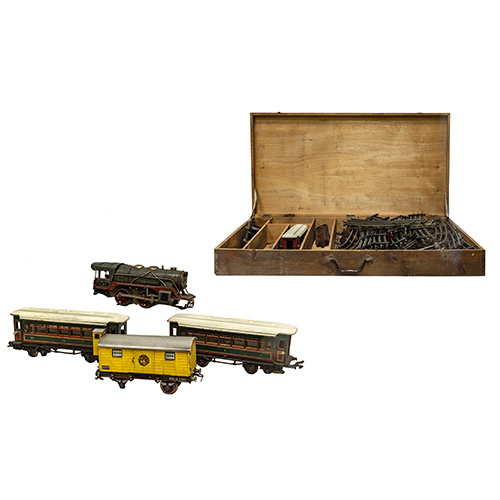 Sub.:17 - Lote: 323 -  Maqueta de tren a vapor en caja de madera original. 