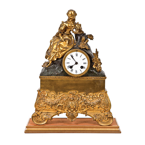 Sub.:17 - Lote: 1224 -  Reloj de sobremesa en bronce dorado y pavonado, Francia, mediados del S.XIX. 