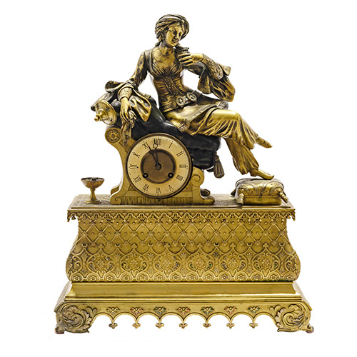 Sub.:19 - Lote: 1270 -  Reloj de bronce dorado al mercurio con representacin de odalisca. 
