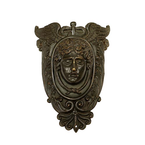 Sub.:25 - Lote: 325 -  Mascarn en bronce patinado de tronera de mesa de billar. La cabeza oscila. s. XIX.