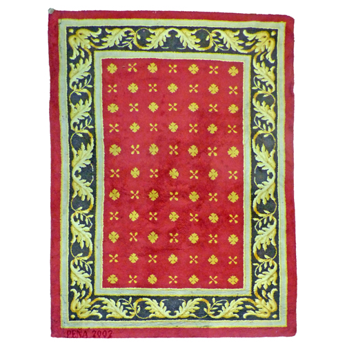 Sub.:8 - Lote: 142 -  Alfombra en lana con decoracin de celosa de flores sobre campo rojo y cenefa en dorado. 