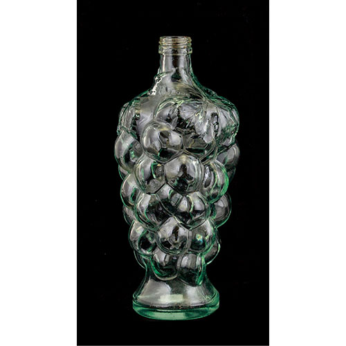 Sub.:1-On - Lote: 814 -  Botella de cristal prensado, con cuerpo en forma de racimo de uva.