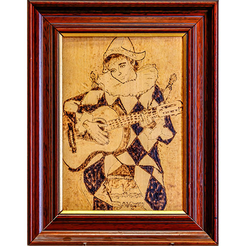 Sub.:1-On - Lote: 711 -  Lmina en madera pirograbada sobre El Arlequn de Pablo Picasso. Enmarcada.