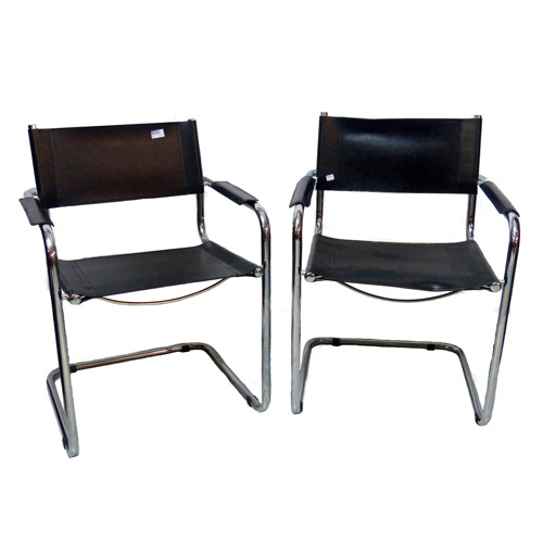 Sub.:1 - Lote: 1014 -  Juego de cuatro sillones en metal cromado y cuero.