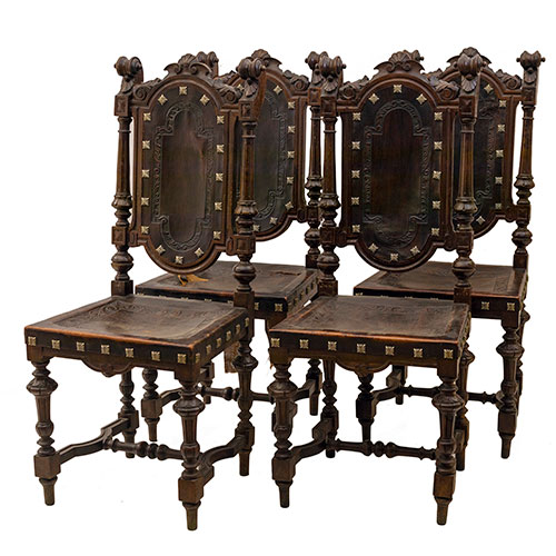 Sub.:10-On - Lote: 29 -  Lote de cuatro sillas castellanas en madera tallada con respaldo y asiento en cuero