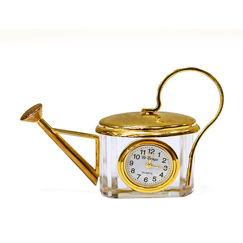 Sub.:10-On - Lote: 705 -  Reloj en cristal y metal dorado con forma de regadera.