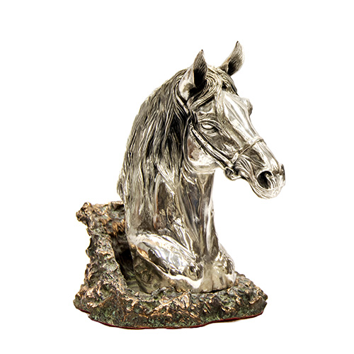 Sub.:10 - Lote: 1652 -  Cabeza de caballo en bronce plateado.