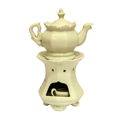 Sub.:11 - Lote: 1353 -  Tetera en porcelana blanca con soporte para mantener el calor y lmpara de alcohol.