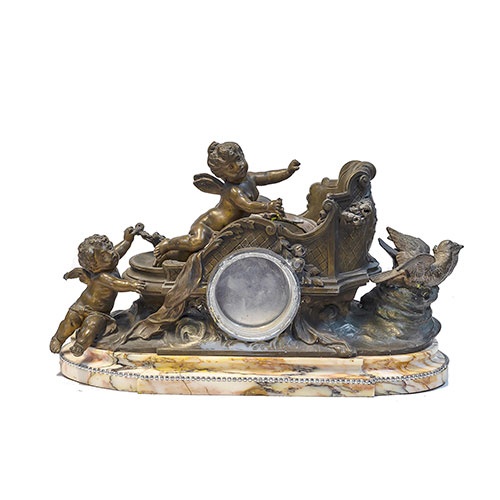 Sub.:12-On - Lote: 133 -  Reloj en calamina sobre base de m�rmol