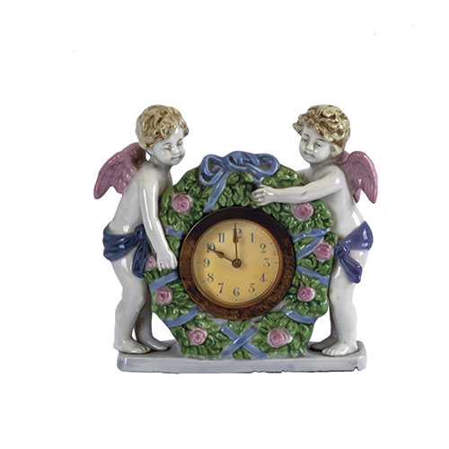Sub.:14-On - Lote: 1224 -  Reloj en porcelana con pareja de ngeles.