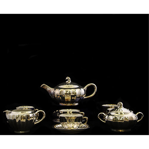 Sub.:14-On - Lote: 606 -  Juego de t con azucarero, lechera, cafetera y seis servicios de taza y plato