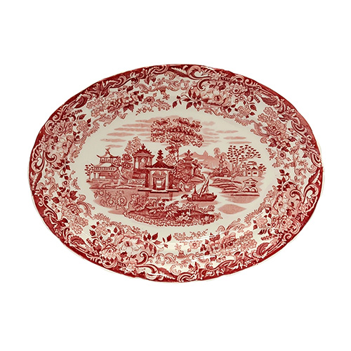 Sub.:14 - Lote: 1394 -  Fuente en loza Pickman en rosa con imagen central de paisaje oriental enmarcado por orlas florales.