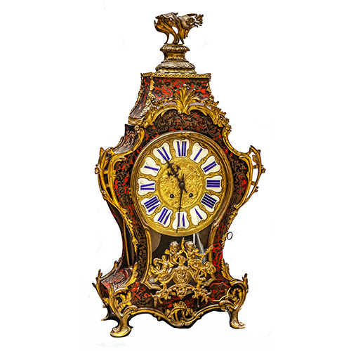 Sub.:17 - Lote: 1243 -  Gran reloj cartel de sobremesa Luis XV con marquetera Boull en bronce y carey. 
