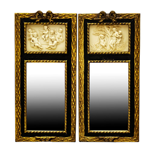 Sub.:17 - Lote: 168 -  Pareja de espejos con marco tallado en pasta y relieves en la parte superior con la representacin de ngeles.