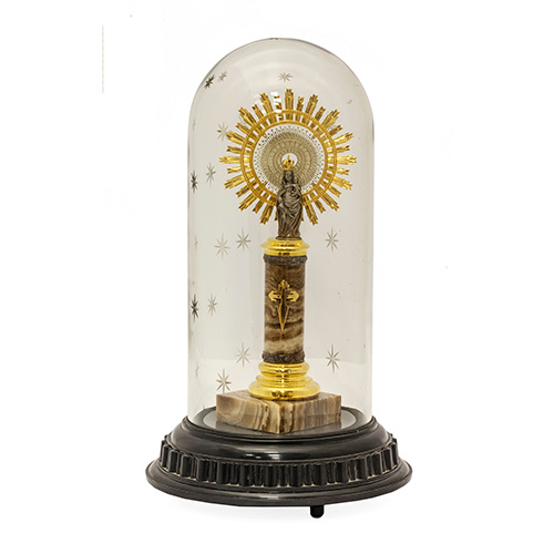 Sub.:17 - Lote: 1320 -  Figura de la Virgen del Pilar en metal plateado con peana y caja musical.