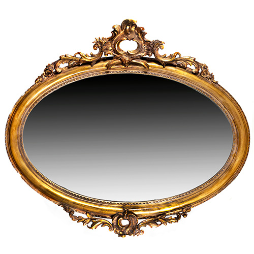 Sub.:17 - Lote: 1146 -  Espejo oval en madera dorada y estucada.