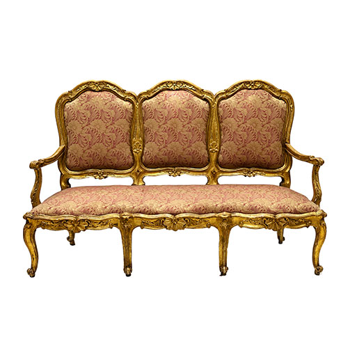 Sub.:18 - Lote: 337 -  Canap dorado s. XVIII en madera tallada con tapicera rosa floral.