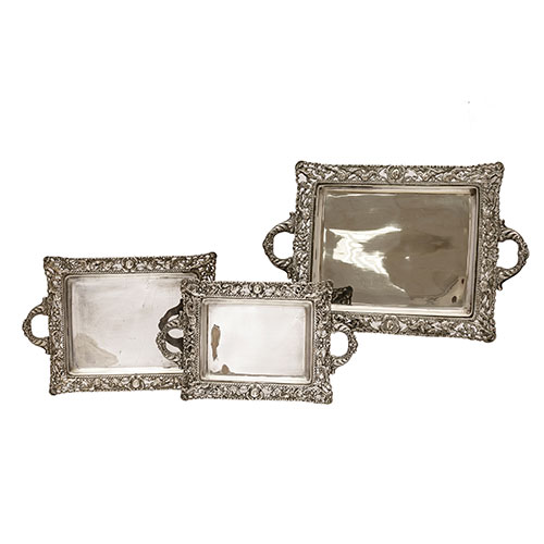 Sub.:18 - Lote: 244 -  Lote de 3 bandejas en plata con asas con trabajo calado en la orla. Peso 1039 gr.