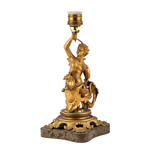 Sub.:19 - Lote: 1271 -  L�mpara de sobremesa realizada en calamina, con personaje mitol�gico de trit�n.