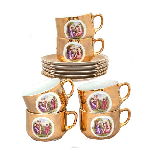 Sub.:2-On - Lote: 856 -  Lote con seis tazas y cinco platos en porcelana dorada con motivos centrales clsicos. Firmadas Angelica Kauffman.