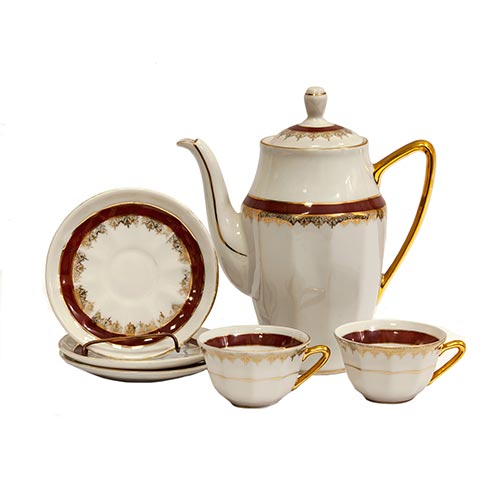 Sub.:2-On - Lote: 773 -  Lote de 8 tazas con 9 platos y cafetera en porcelana de Limoges con banda roja y cenefa en dorado.