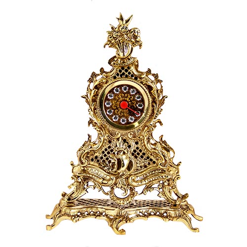 Sub.:2-On - Lote: 977 -  Reloj de sobremesa estilo Luis XV en bronce. Maquinaria de pila.