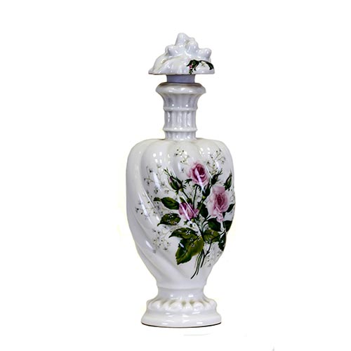 Sub.:2-On - Lote: 821 -  Frasco de perfume marca Porcela Halga (Francia) con cuello trabajado y decoracin floral polcroma en el cuerpo inferior.