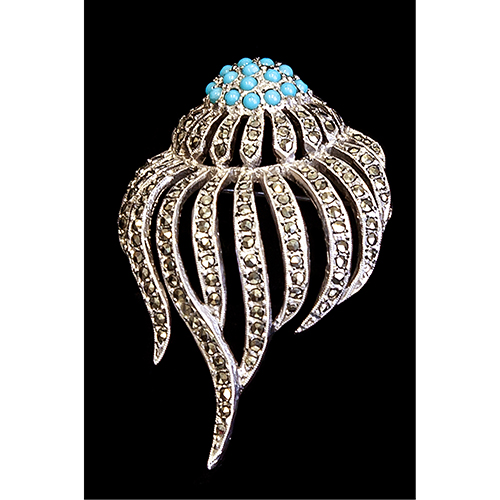 Sub.:20 - Lote: 1437 -  Broche redondo de plata baja de 800, con brillantitos. Peso total: 20 grs.