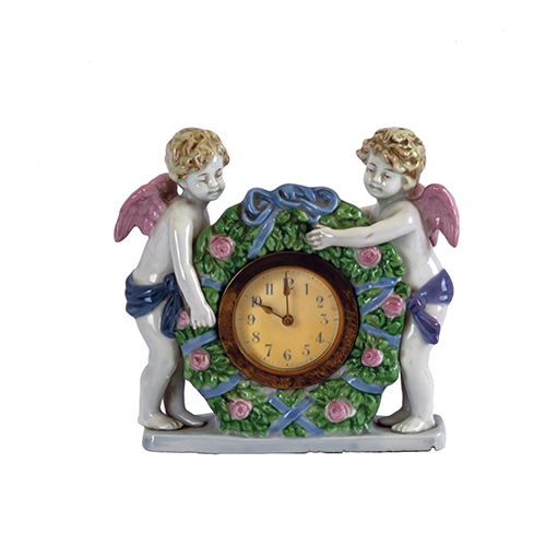 Sub.:20 - Lote: 1246 -  Reloj en porcelana con pareja de ngeles.