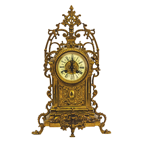 Sub.:20 - Lote: 351 -  Reloj de sobremesa estilo Napolen III en bronce con esfera esmaltada.