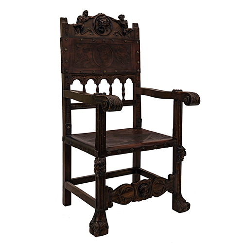 Sub.:20 - Lote: 1326 -  Sill�n de despacho tipo frailero en madera tallada, con asiento y respaldo en cuero.