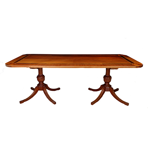 Sub.:20 - Lote: 326 -  Mesa de comedor en madera con decoracin de marquetera lineal en el permetro de la tapa y dos patas con cuatro pies cada una.