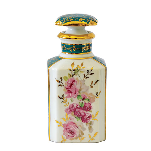 Sub.:21 - Lote: 1326 -  Botella de tocador en porcelana con tap�n y ribetes dorados. Francia.