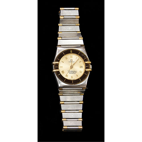 Sub.:23 - Lote: 1340 -  Reloj Omega modelo Constellation Manhattan de seora. Acero y dorado. Con inscripcin 6104/013.