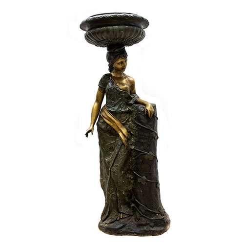 Sub.:24 - Lote: 271 -  Macetero modernista en bronce en forma de mujer con columna. Fundici�n s. XX.