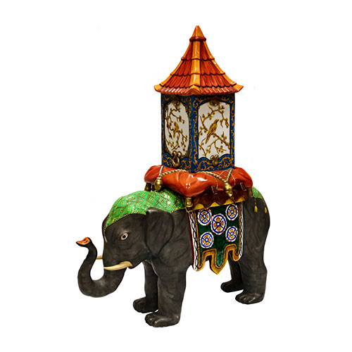 Sub.:24 - Lote: 1342 -  Elefante con howdah para transportar viajeros realizado en porcelana.