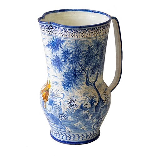 Sub.:25 - Lote: 1294 -  Parag�ero con forma de jarra en cer�mica pintada de Talavera. Asa consolidada.