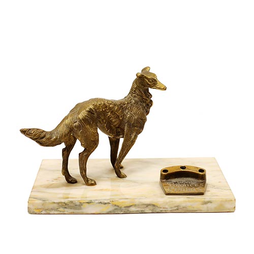 Sub.:25 - Lote: 1279 -  Soporte para bol�grafos con galgo afgano en bronce sobre base de m�rmol. Inscripci�n Bronce Pradas.