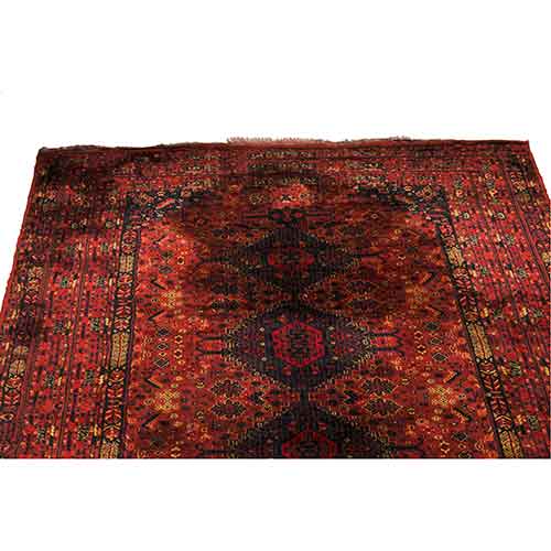 Sub.:28 - Lote: 129 -  Gran alfombra tipo persa con motivos geomtricos sobre fondo granate