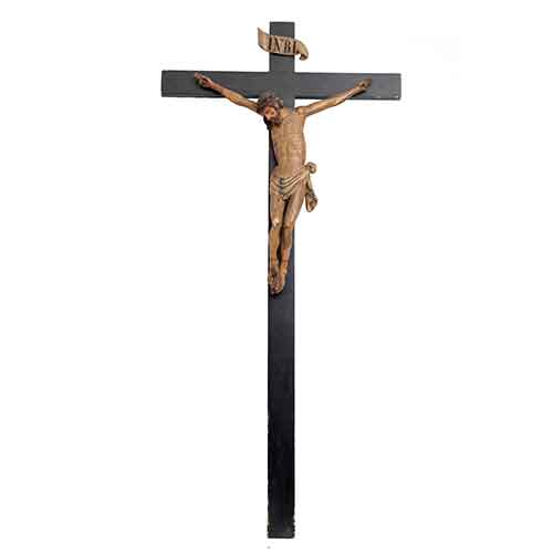 Sub.:28 - Lote: 1149 -  Crucifijo en madera tallada realizado en el siglo XVIII