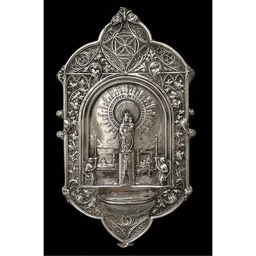 Sub.:28 - Lote: 285 -  Aguabenditera en metal plateado con representacin de la Virgen del Pilar.