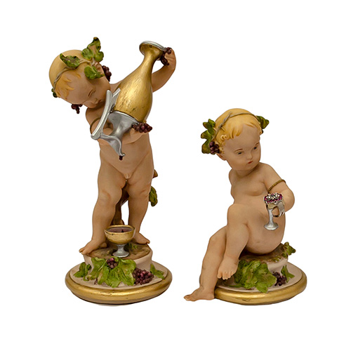 Sub.:3-On - Lote: 342 -  Ni�os Baco. Pareja de figuras en resina policromada.