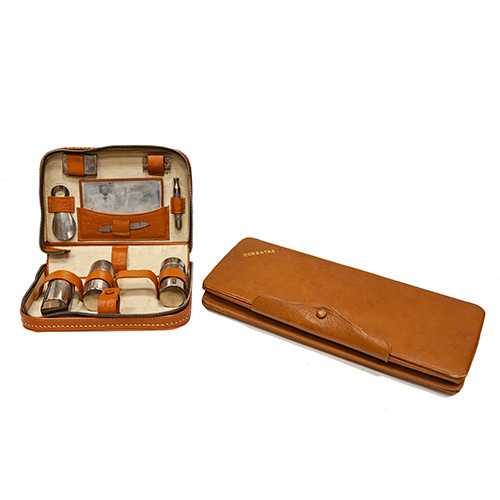 Sub.:3-On - Lote: 203 -  Lote con neceser en estuche de cuero y estuche corbatero.