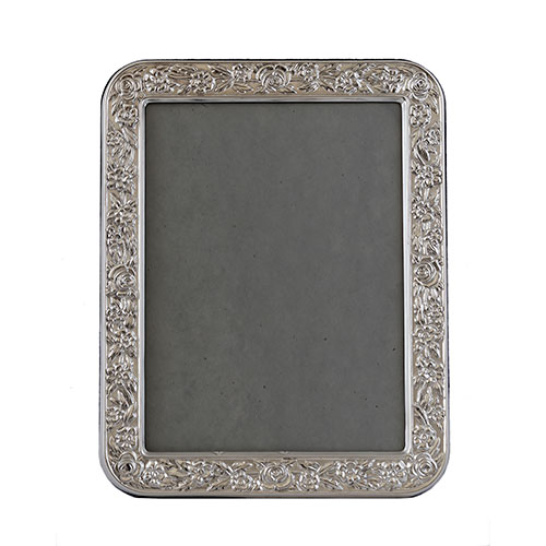 Sub.:30 - Lote: 187 -  Portarretratos en plata repujada.