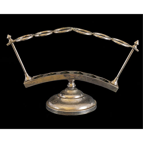 Sub.:32 - Lote: 1435 -  Soporte para bastones en metal plateado con capacidad para seis.