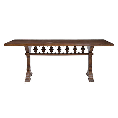 Sub.:32 - Lote: 1438 -  Mesa r�stica en madera patinada dos pies unidos por chambrana con balaustres torneados.