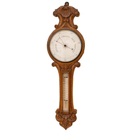 Sub.:33 - Lote: 1418 -  Bar�metro en madera de roble tallada a�os 50