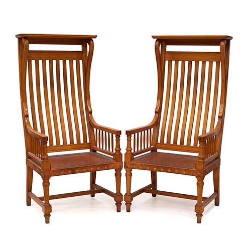 Sub.:34 - Lote: 133 -  Pareja de sillones de respaldo alto en cerezo y asientos de cuero